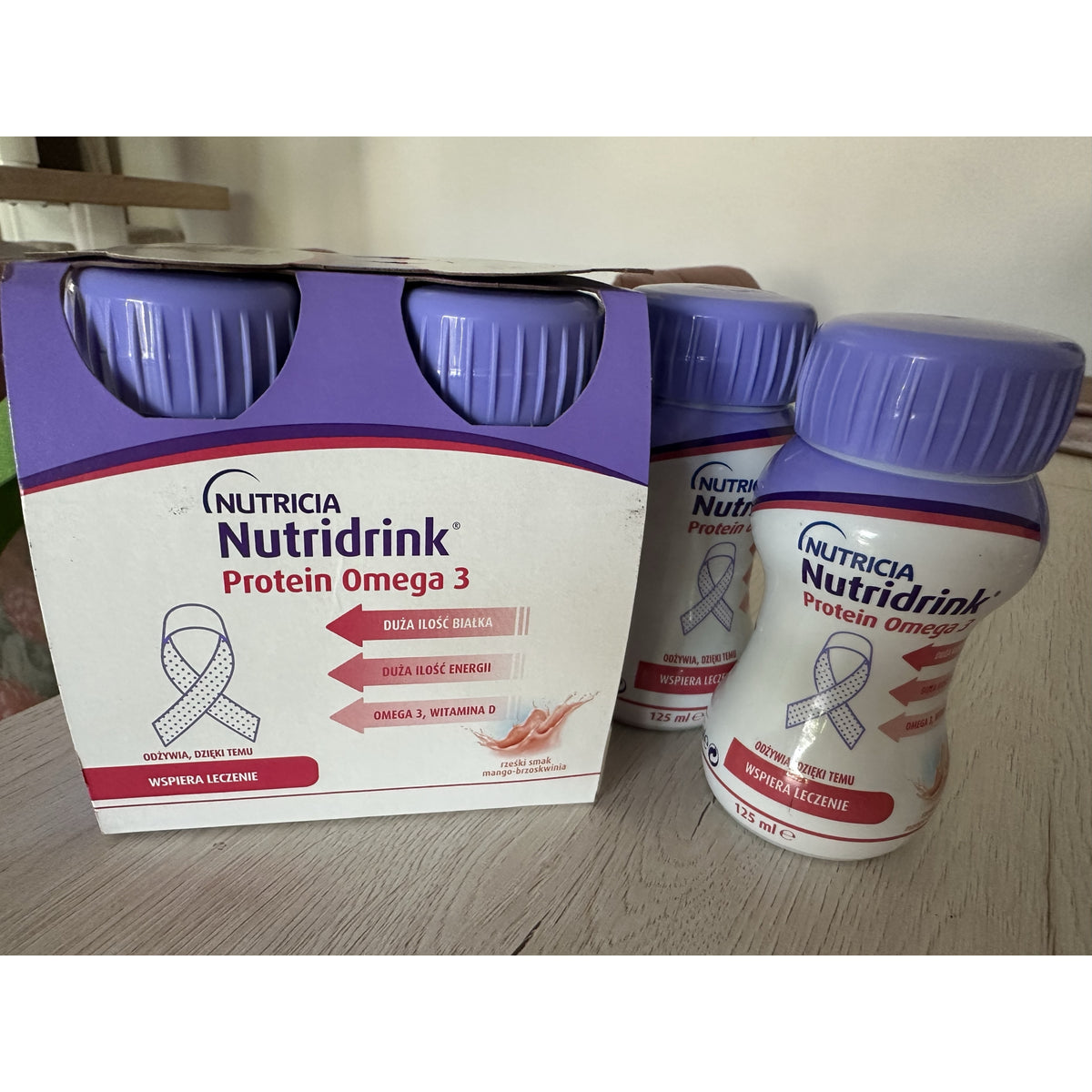 Nutridrink Protein Omega 3 mangų ir persikų skonio, 4 x 125 ml